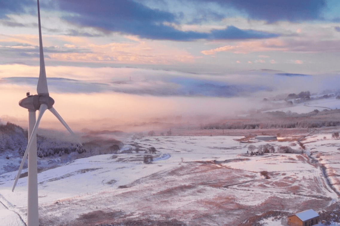 wind turbine in snowy landscape